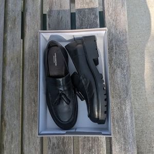 black heeled loafers